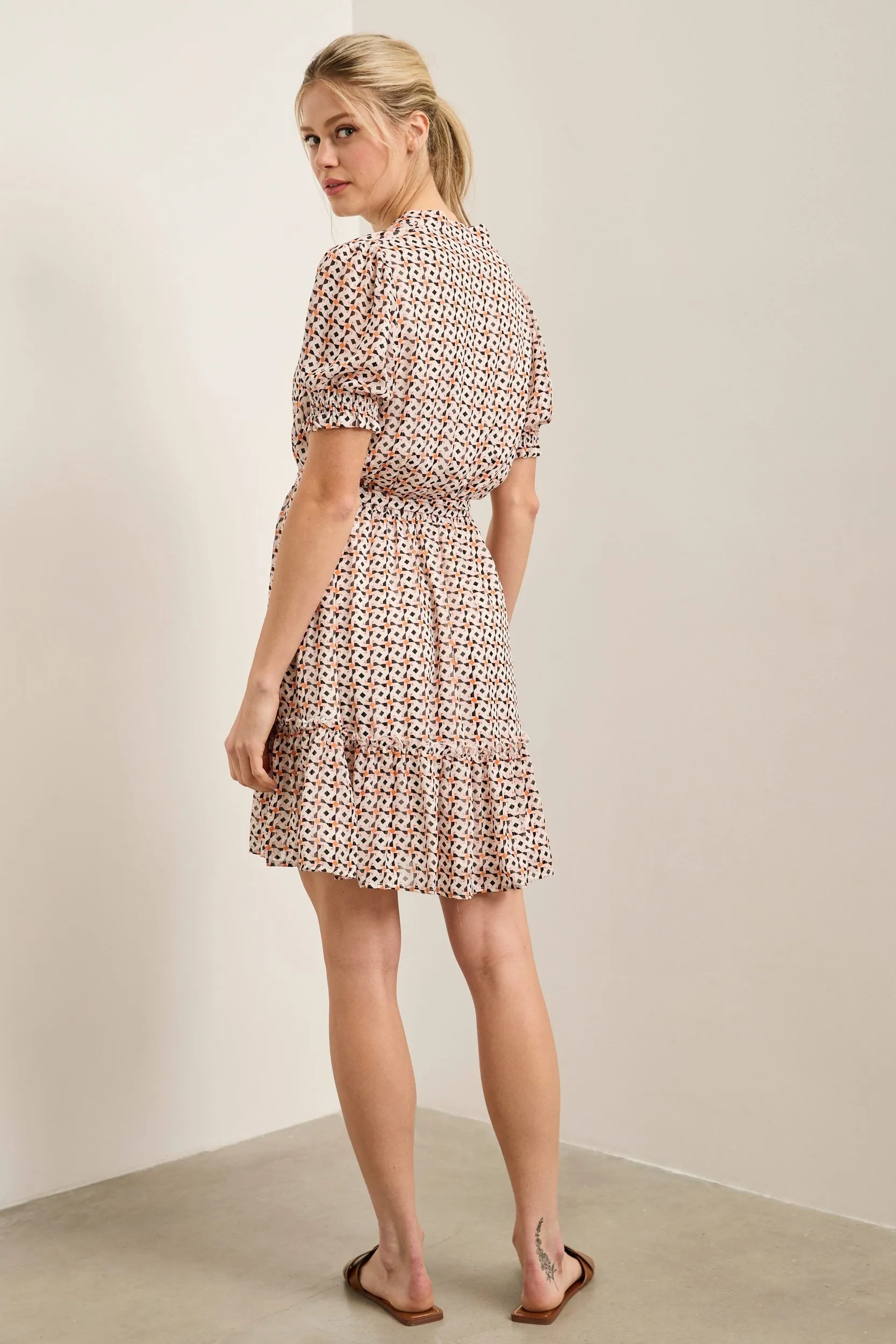 Fluid dress with ruching details