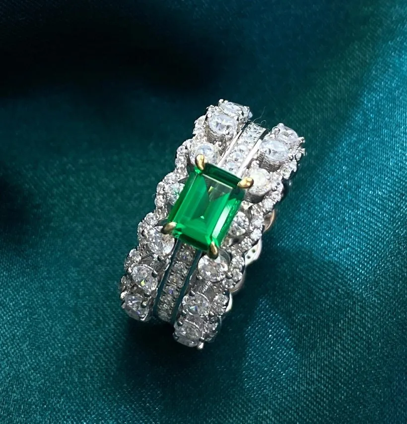 Luxurious Emerald and Round Cut Cubic Zirconia Eternity Band